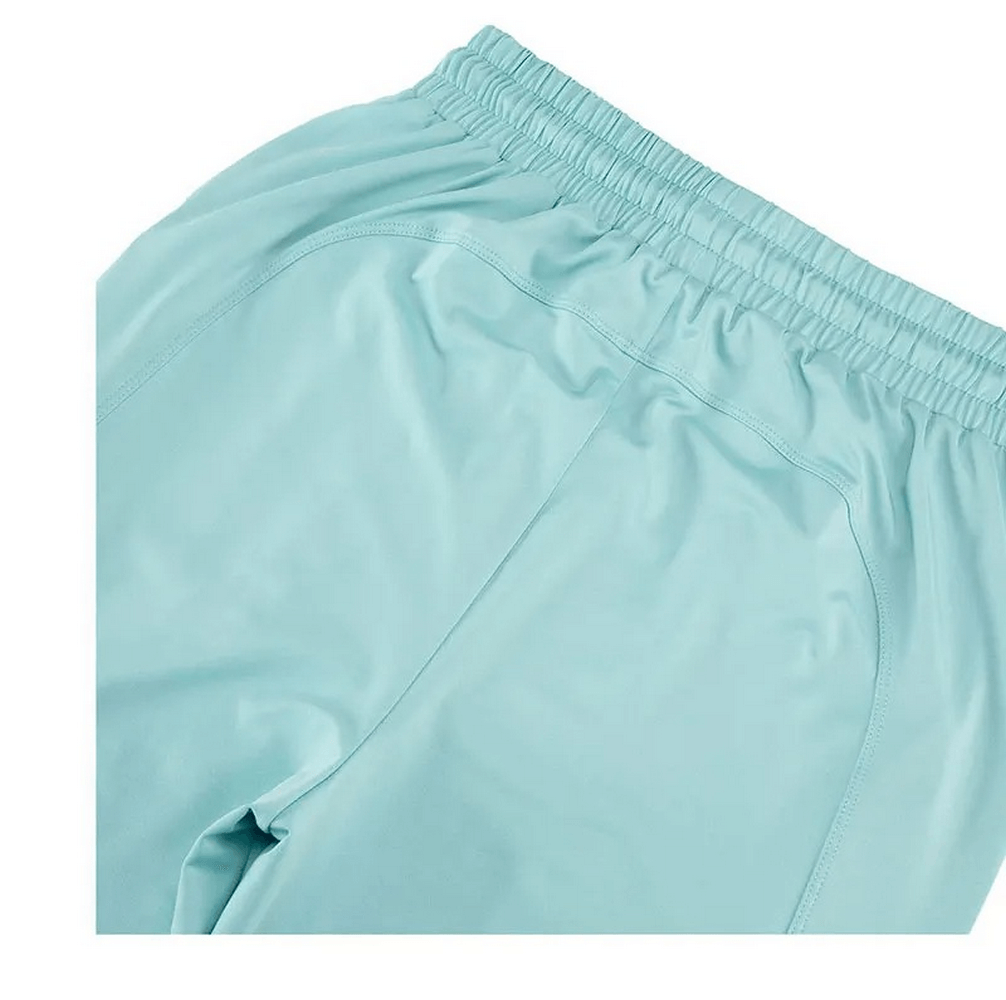 Close-up of light blue athletic pants from SF2090 women's three-toned clothing set, featuring an elastic waistband.